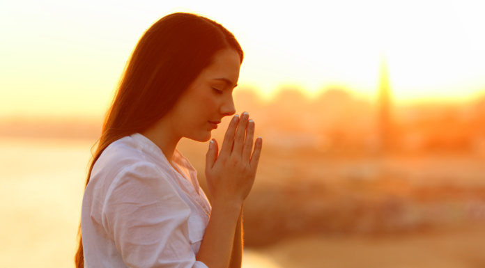 A woman praying.