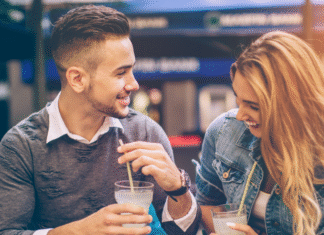 A couple out on a date drinking.