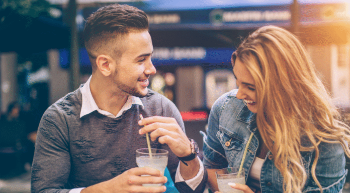 A couple out on a date drinking.