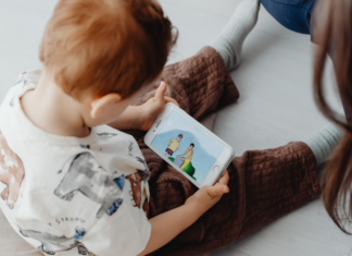 Paw Patrol Saves the (Every)Day A preschooler on a phone watching Paw Patrol.