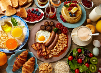 A table full of breakfast foods.