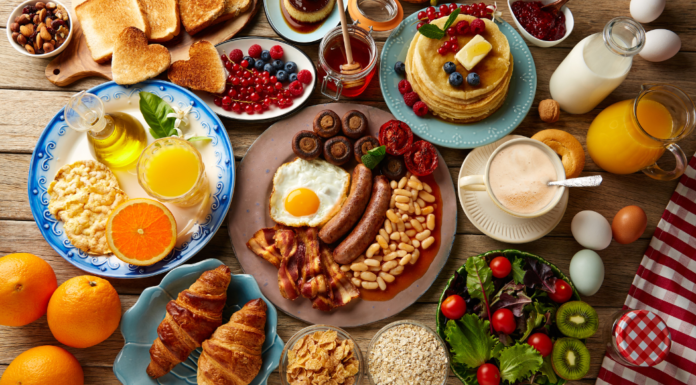 A table full of breakfast foods.