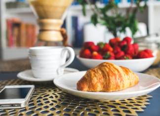 Breakfast in a Hurry A simple breakfast of a croissant and strawberries.