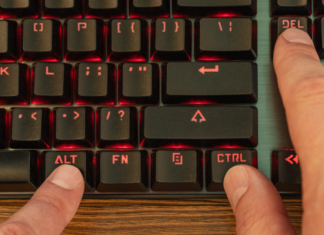 Pressing control, alt, delete on the keyboard.