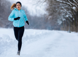A woman running in the snow.