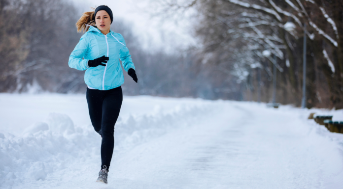 A woman running in the snow.