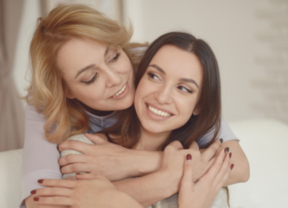 A Life-Long Love Letter to My Daughter A mother holding her adult daughter.