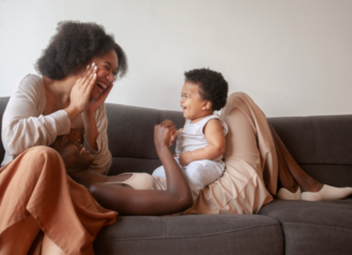 A mom playing peak-a-boo.