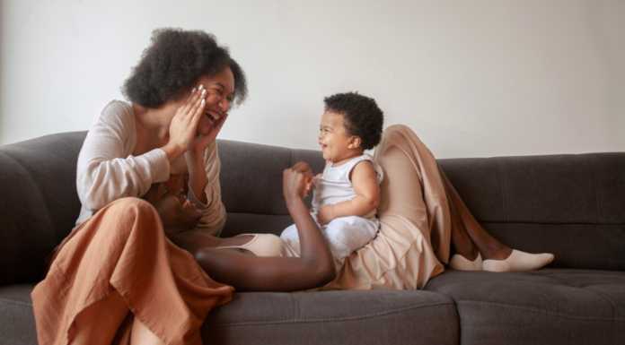 A mom playing peak-a-boo.