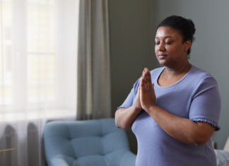 A woman praying.