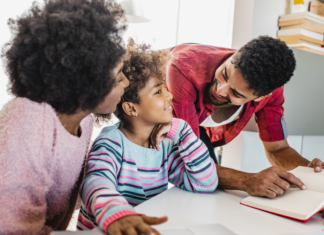 Traditional Upbringing Meets Modern Parenting Modern parents with their child.