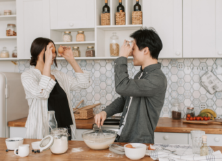 A couple in the kitchen.
