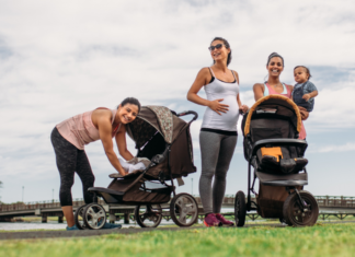 Women exercising with their babies and strollers.