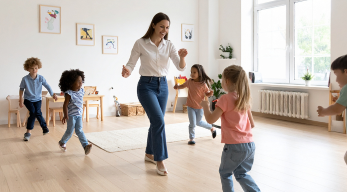 A daycare provider dancing with her class.