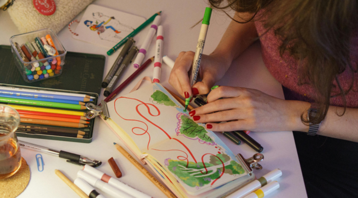 A woman doodling.