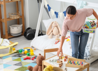 Dropping the Ball {I can’t do it all} A woman cleaning up a messy bedroom.