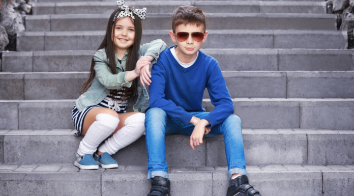 Kids posing on stairs.