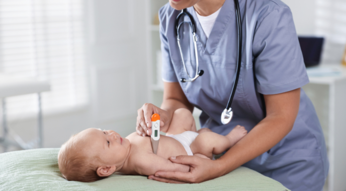 A pediatrician examining a baby.