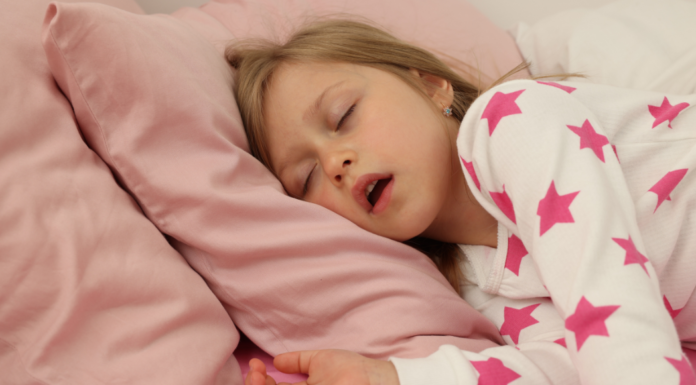 A girl snoring.