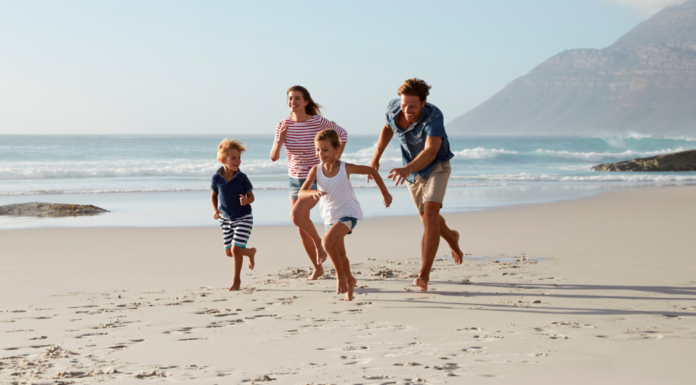 Stop Talking About 18 Summers A family running on the beach.