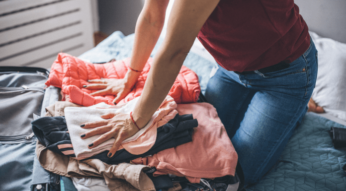 Packing a suitcase quickly.