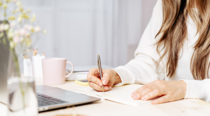 A woman writing.