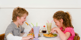 Kids eating at a restaurant