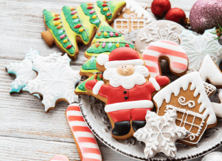 A plate of decorated Christmas cookies.