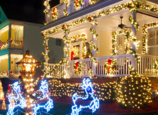 A house decorated in holiday lights.