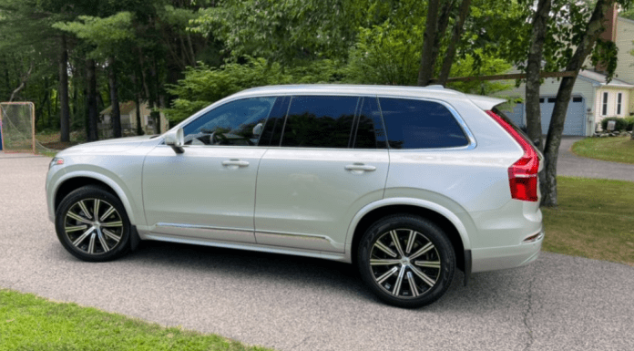 Volvo XC90 in a driveway.