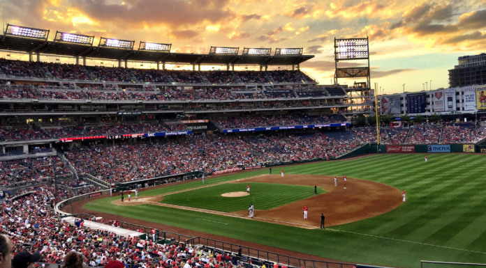 A baseball stadium full of people.