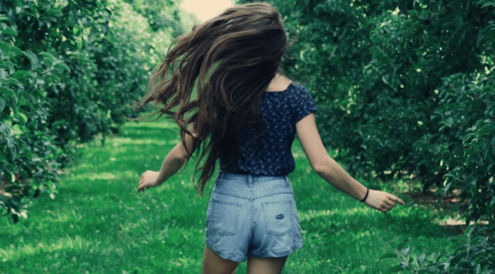 A sassy tween running.