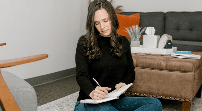 A woman writing.