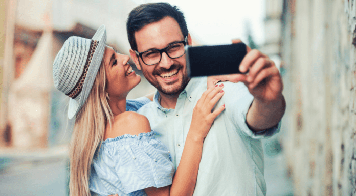 A couple taking a selfie.