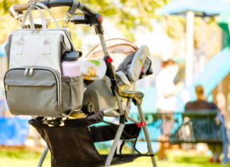 A stroller and diaper bag full of the best baby products.