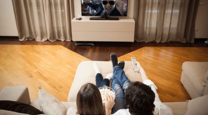 A couple watching a movie.