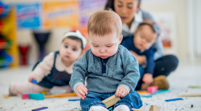 Babies playing at daycare.