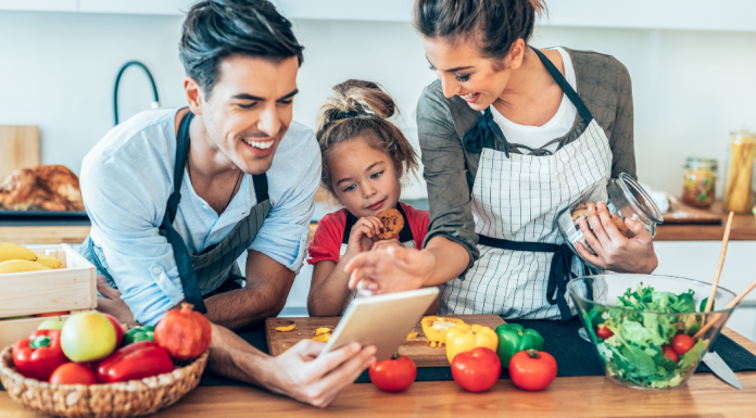 A family making a meal together.