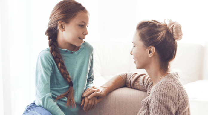 A mom talking with her teen daughter.