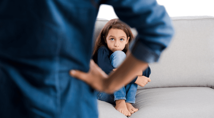 A girl getting in trouble.