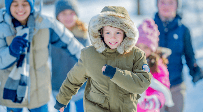 Kids bundled up to play outside in the winter.