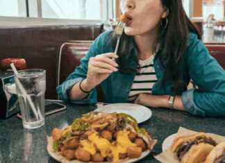 Fairfield County Diners A woman enjoying food at a local diner.