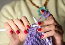 A woman knitting.