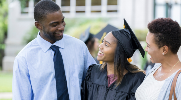 Parents with their graduate.