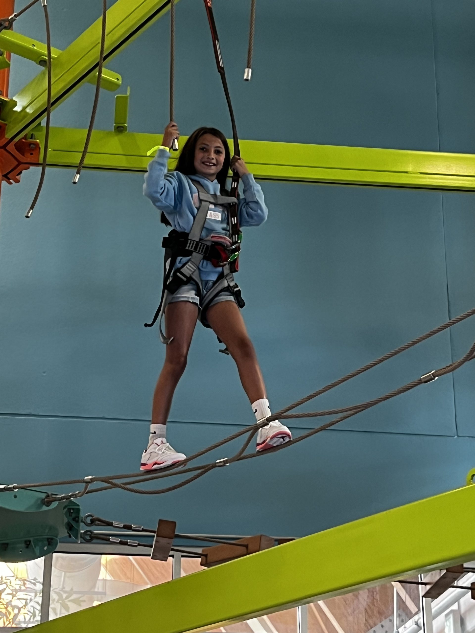 Walking on a ropes course at Kartrite Resort.