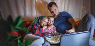 A family watching a movie together.