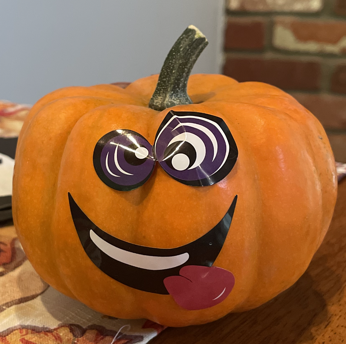 Decorated pumpkin with stickers.