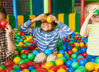 Indoor Play Spaces in Fairfield County Kids playing in a ball pit.
