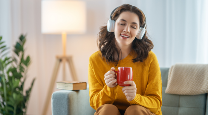 A woman listening to Taylor Swift.
