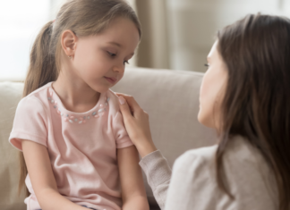 A mom speaking to her daughter.
